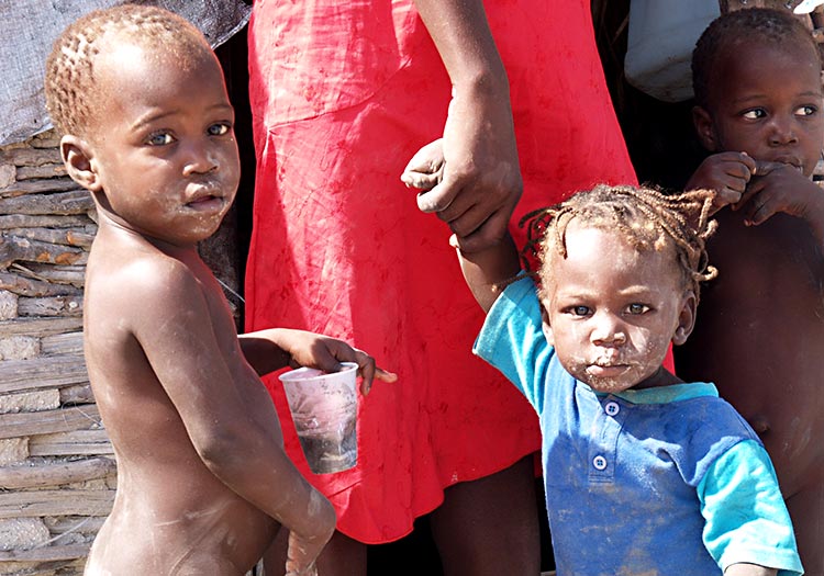 Starving children eating dirt in Haiti.