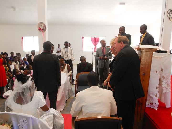 Bobby-and-Sherry-praying-at-Edeline's-wedding